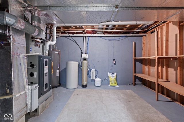8934 Pinyon Ct, Indianapolis, IN 46260 - unfinished basement with electric water heater and a water softener