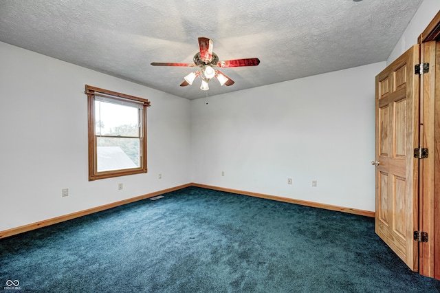 7333 State Road 42, Martinsville, IN 46151 - empty room featuring a ceiling fan, dark colored carpet, baseboards, and a textured ceiling