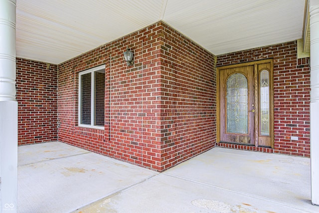 7333 State Road 42, Martinsville, IN 46151 - view of exterior entry with brick siding and a patio area