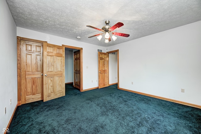 7333 State Road 42, Martinsville, IN 46151 - unfurnished bedroom featuring baseboards, dark carpet, ceiling fan, and a textured ceiling