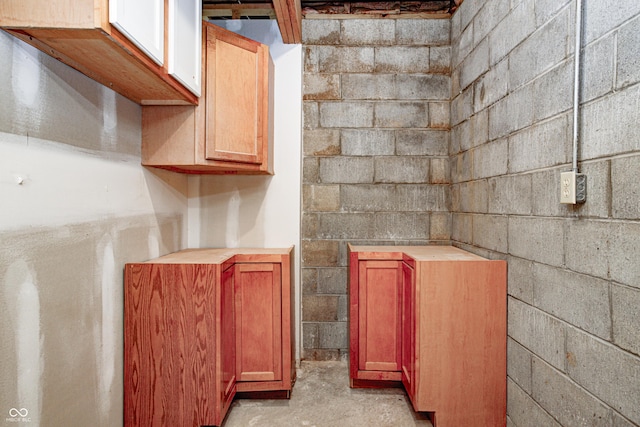 7333 State Road 42, Martinsville, IN 46151 - kitchen with concrete block wall, concrete floors, and light countertops