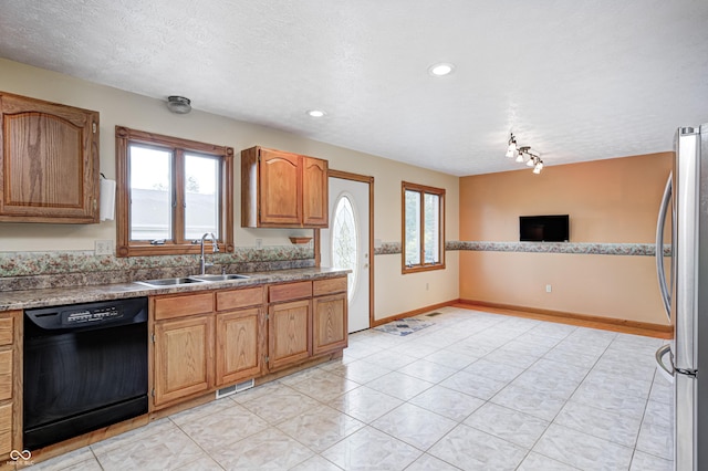 7333 State Road 42, Martinsville, IN 46151 - kitchen featuring dishwasher, a sink, freestanding refrigerator, a textured ceiling, and light countertops