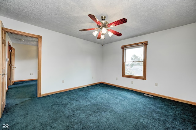 7333 State Road 42, Martinsville, IN 46151 - unfurnished room featuring ceiling fan, dark carpet, baseboards, and a textured ceiling