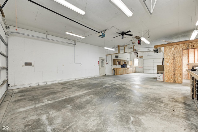 7333 State Road 42, Martinsville, IN 46151 - garage with a workshop area, ceiling fan, and a garage door opener