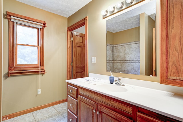 7333 State Road 42, Martinsville, IN 46151 - bathroom featuring vanity, baseboards, and a textured ceiling