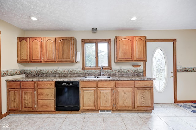7333 State Road 42, Martinsville, IN 46151 - kitchen with dishwasher, a sink, brown cabinetry, recessed lighting, and a textured ceiling