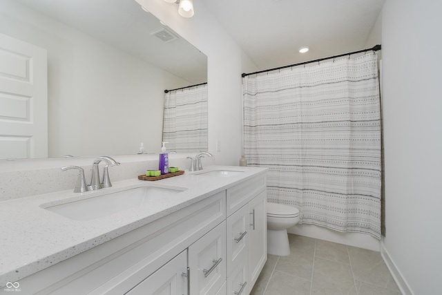 1510 Stonehaven Dr, Westfield, IN 46074 - bathroom featuring double vanity, tile patterned flooring, toilet, and a shower with shower curtain