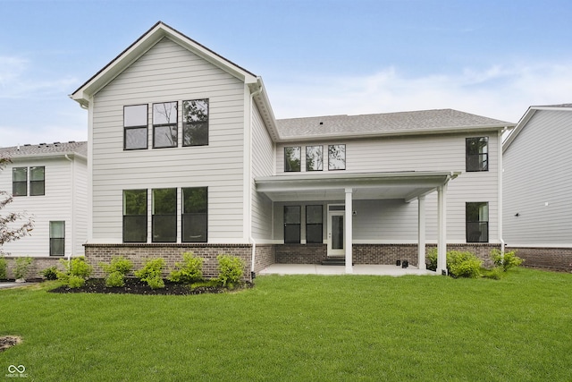 1510 Stonehaven Dr, Westfield, IN 46074 - back of house featuring brick siding, a lawn, and a patio area
