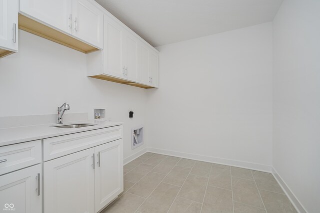 1510 Stonehaven Dr, Westfield, IN 46074 - washroom with hookup for a washing machine, cabinet space, electric dryer hookup, and baseboards