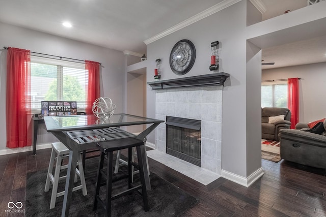 121 George Ct, Danville, IN 46122 - dining room featuring ornamental molding, a fireplace, baseboards, wood finished floors, and recessed lighting