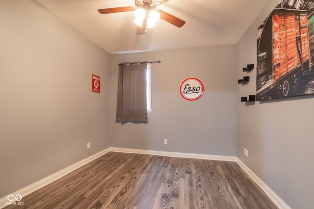 121 George Ct, Danville, IN 46122 - spare room with ceiling fan, wood finished floors, and baseboards