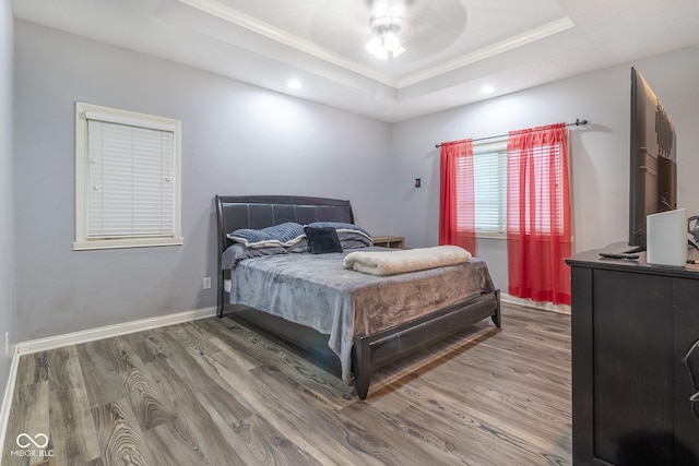 121 George Ct, Danville, IN 46122 - bedroom featuring a tray ceiling, crown molding, wood finished floors, recessed lighting, and baseboards