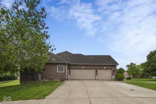 121 George Ct, Danville, IN 46122 - view of front facade featuring a garage, concrete driveway, brick siding, and a front lawn