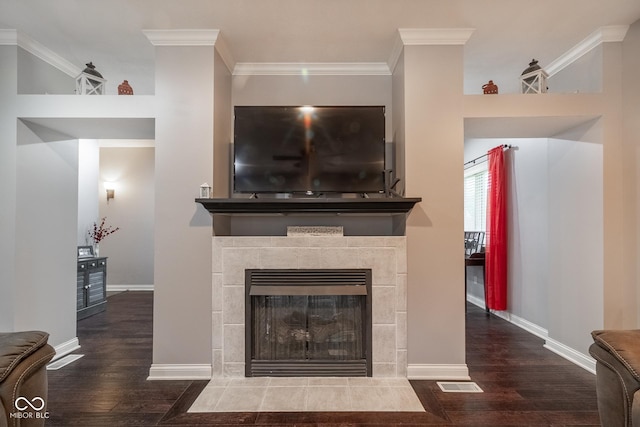 121 George Ct, Danville, IN 46122 - detailed view of wood finished floors, crown molding, baseboards, and a fireplace