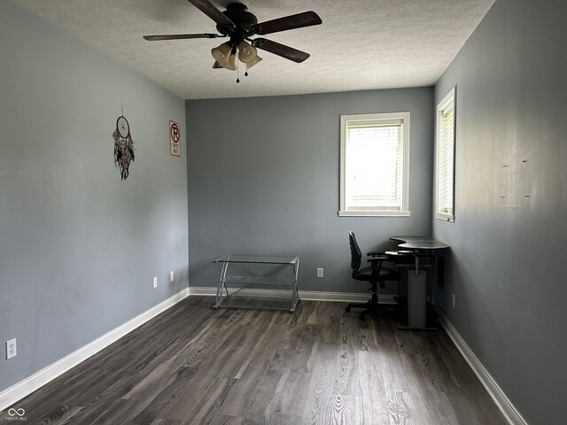 121 George Ct, Danville, IN 46122 - home office featuring dark wood-type flooring, a textured ceiling, ceiling fan, and baseboards