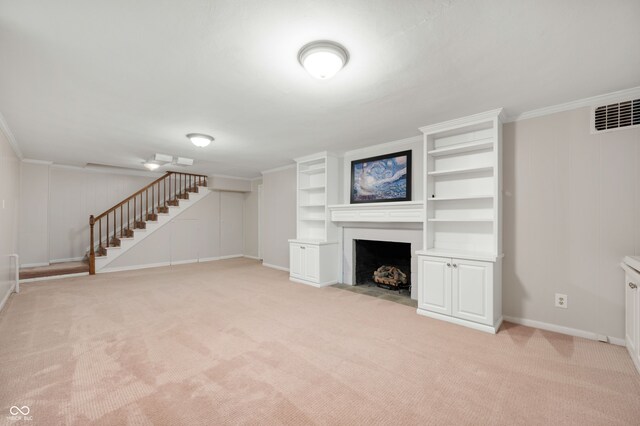 6020 Gladden Dr, Indianapolis, IN 46220 - unfurnished living room with stairway, light colored carpet, a fireplace with flush hearth, ornamental molding, and baseboards