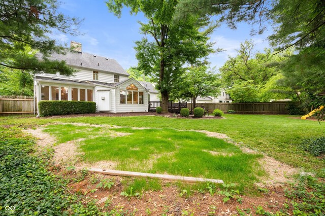 6020 Gladden Dr, Indianapolis, IN 46220 - view of yard featuring a sunroom