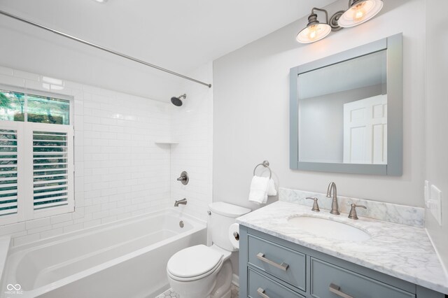 6020 Gladden Dr, Indianapolis, IN 46220 - bathroom with toilet, vanity, and shower / tub combination