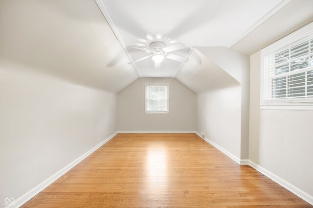 6020 Gladden Dr, Indianapolis, IN 46220 - additional living space featuring light wood-style flooring, vaulted ceiling, baseboards, and a ceiling fan