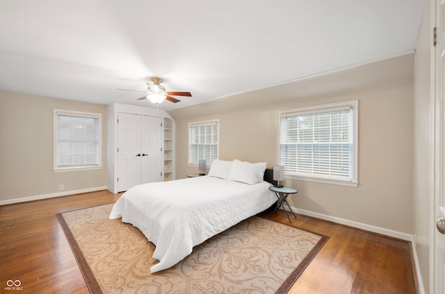 6020 Gladden Dr, Indianapolis, IN 46220 - bedroom with baseboards, wood finished floors, and a ceiling fan
