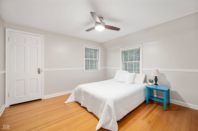 6020 Gladden Dr, Indianapolis, IN 46220 - bedroom featuring baseboards, light wood-style flooring, and ceiling fan