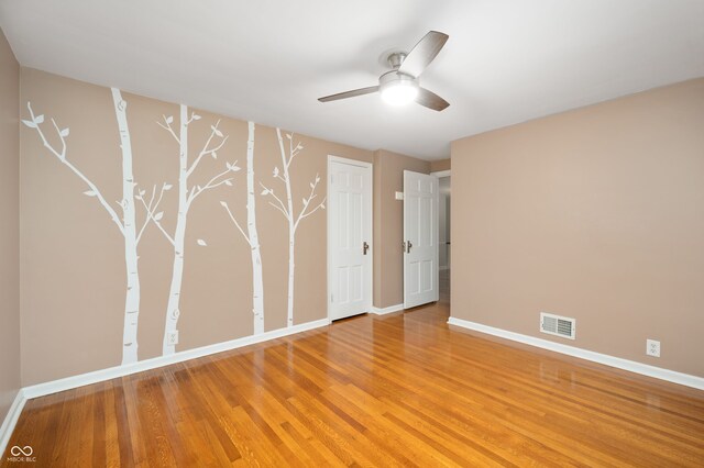 6020 Gladden Dr, Indianapolis, IN 46220 - empty room featuring light wood-type flooring, baseboards, and ceiling fan