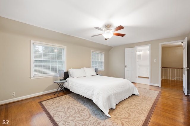 6020 Gladden Dr, Indianapolis, IN 46220 - bedroom with wood finished floors, baseboards, and a ceiling fan