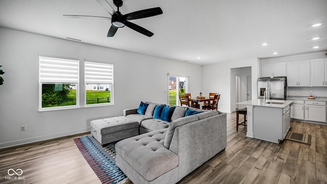 7226 Sayers Rd, Indianapolis, IN 46259 - living area with recessed lighting, wood finished floors, ceiling fan, and baseboards