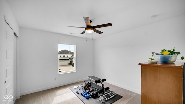 7226 Sayers Rd, Indianapolis, IN 46259 - workout area featuring a ceiling fan, carpet floors, and baseboards
