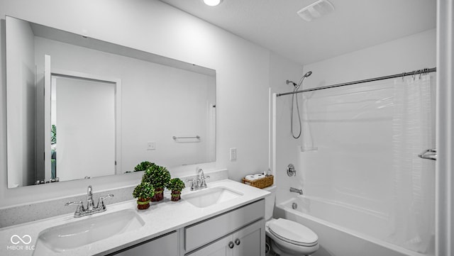 7226 Sayers Rd, Indianapolis, IN 46259 - bathroom featuring double vanity, shower / bath combo with shower curtain, and toilet