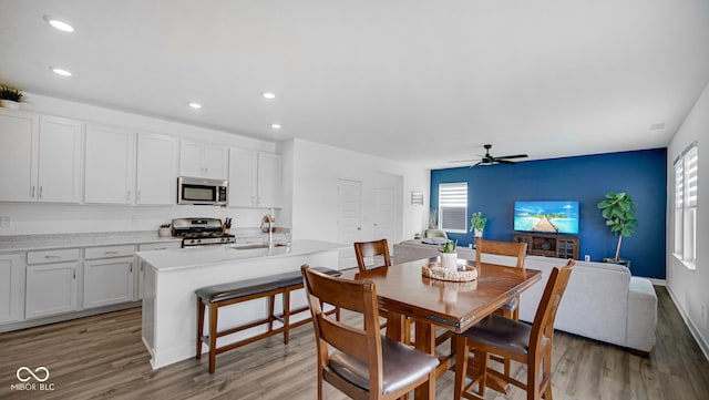 7226 Sayers Rd, Indianapolis, IN 46259 - dining room featuring ceiling fan, recessed lighting, and light wood-style flooring