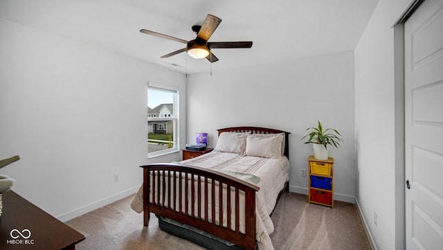 7226 Sayers Rd, Indianapolis, IN 46259 - bedroom with carpet flooring, baseboards, and ceiling fan