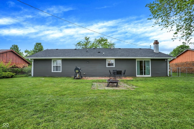 200 Forum Dr, Whiteland, IN 46184 - rear view of house with a fire pit, a chimney, and a shingled roof
