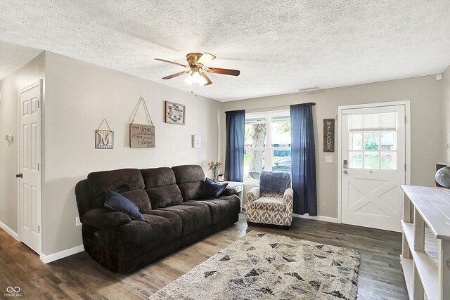 200 Forum Dr, Whiteland, IN 46184 - living room featuring ceiling fan, wood finished floors, baseboards, and a textured ceiling
