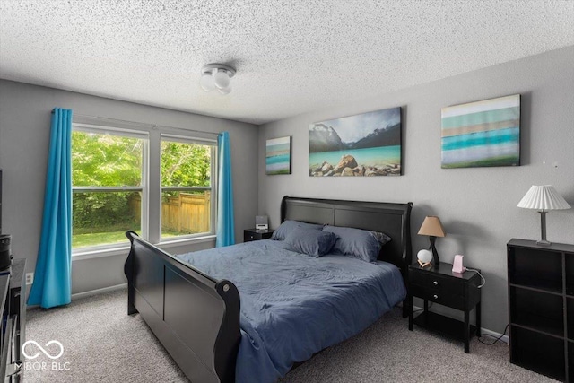 8446 S Paddleboat Ln, Pendleton, IN 46064 - bedroom featuring light colored carpet, a textured ceiling, and baseboards