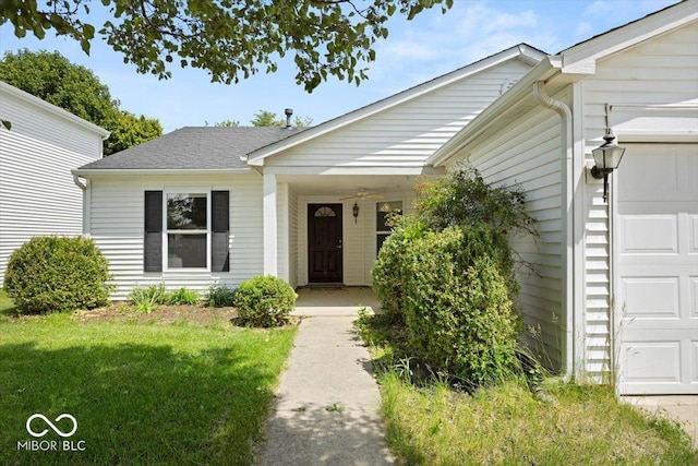 8446 S Paddleboat Ln, Pendleton, IN 46064 - ranch-style home featuring a garage, a front lawn, and a porch
