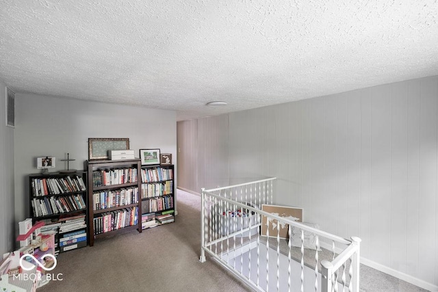 3934 N Kenwood Ave, Indianapolis, IN 46208 - carpeted bedroom with a textured ceiling
