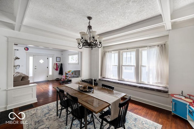 3934 N Kenwood Ave, Indianapolis, IN 46208 - dining area featuring a chandelier, coffered ceiling, beamed ceiling, a textured ceiling, and wood finished floors