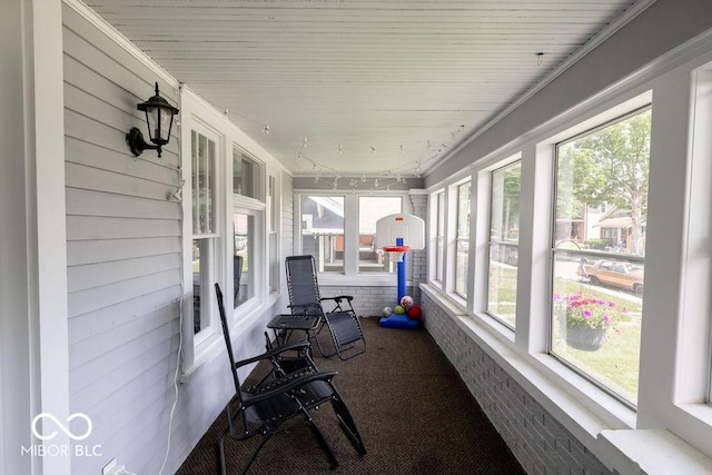 3934 N Kenwood Ave, Indianapolis, IN 46208 - sunroom featuring carpet and plenty of natural light