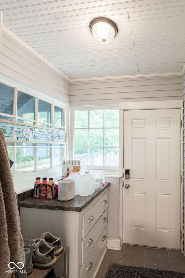 3934 N Kenwood Ave, Indianapolis, IN 46208 - laundry room with wooden ceiling and dark tile patterned floors
