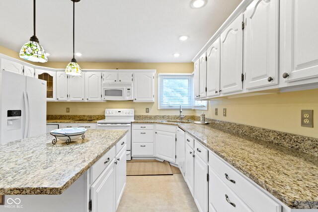 8723 Bergeson Dr, Indianapolis, IN 46278 - kitchen with white appliances, a sink, white cabinetry, and recessed lighting