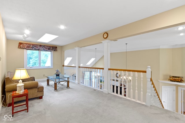 8723 Bergeson Dr, Indianapolis, IN 46278 - sitting room featuring a skylight, carpet floors, baseboards, an upstairs landing, and recessed lighting