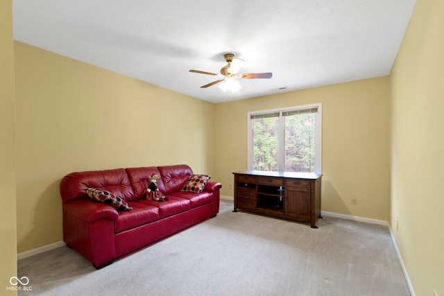 8723 Bergeson Dr, Indianapolis, IN 46278 - living area featuring carpet, a ceiling fan, and baseboards