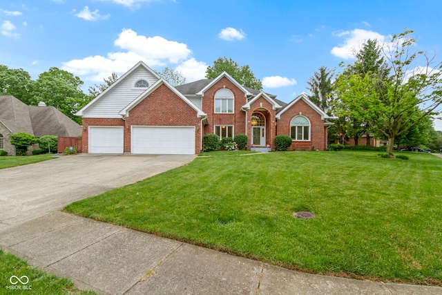 8723 Bergeson Dr, Indianapolis, IN 46278 - traditional-style home with brick siding, a front lawn, concrete driveway, and a garage