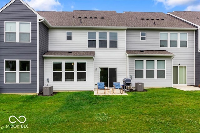 14350 Ludwell Ct, Fishers, IN 46037 - back of house featuring a yard, a patio area, and cooling unit
