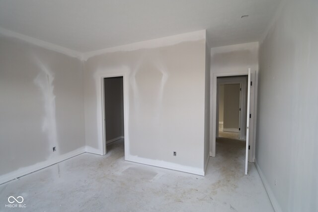 4290 Ironclad Dr, Bargersville, IN 46106 - unfurnished bedroom with concrete flooring and baseboards