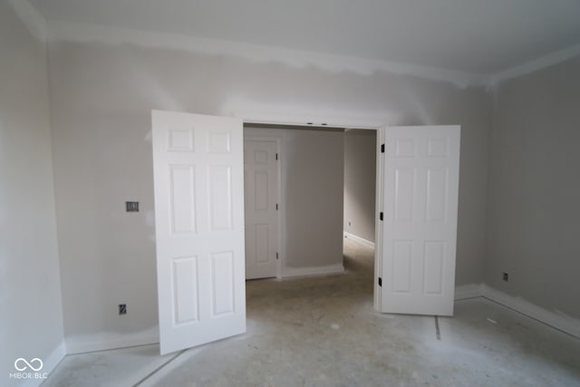 4290 Ironclad Dr, Bargersville, IN 46106 - unfurnished bedroom with baseboards and concrete floors