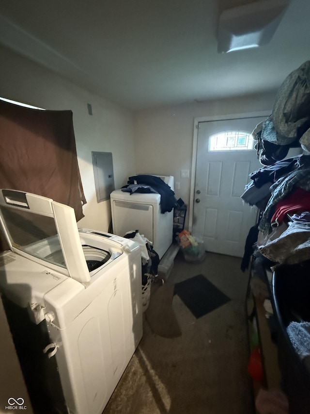 laundry area with washer and dryer, electric panel, and carpet floors