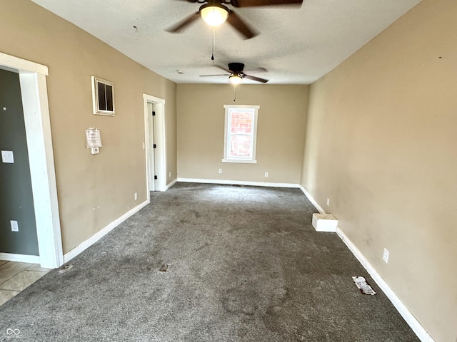 104 W Pearl St, Trafalgar, IN 46181 - carpeted spare room featuring a ceiling fan, baseboards, and a textured ceiling