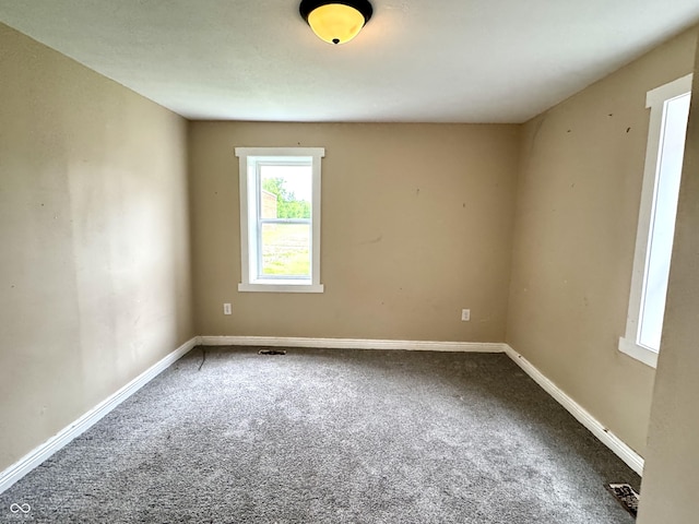 104 W Pearl St, Trafalgar, IN 46181 - carpeted empty room featuring baseboards
